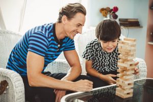 father and son playing a game